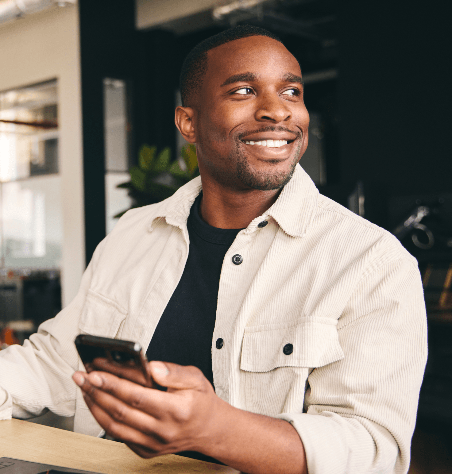 Happy person using Siah Labs business portal